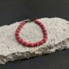 PULSEIRA DE PEDRA CORAL COM DISCO